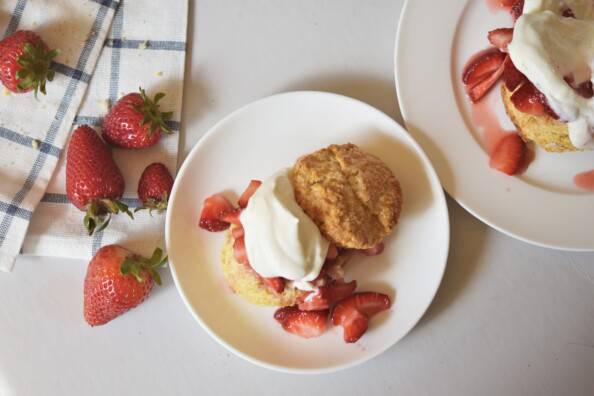 overhead of strawberry shortcake on a white plate