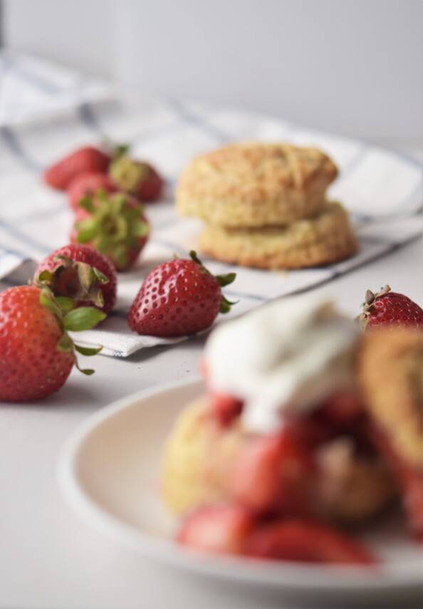 blurred strawberry shortcake in the foreground