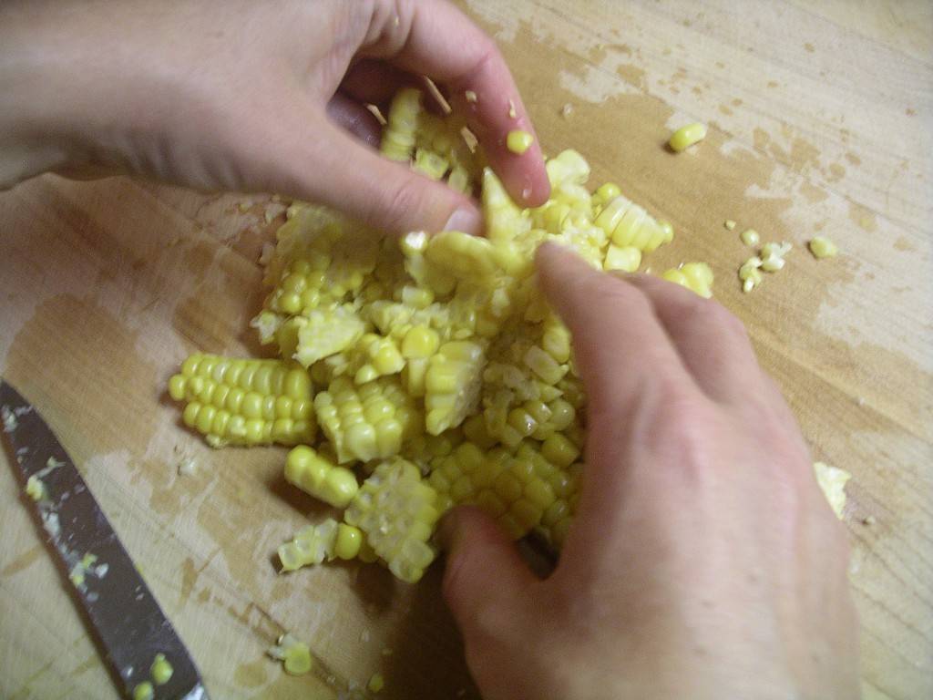 crumbling the corn