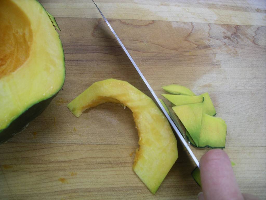 cutting the peel off squash