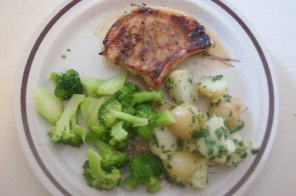 Brown-Sugar Grilled Pork Chops, new potatoes with chive-parsley butter, steamed broccoli