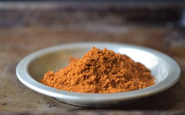 south indian masala in a silver bowl with dark background