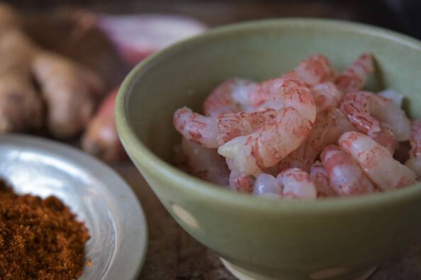 west coast side strip shrimp in a green bowl