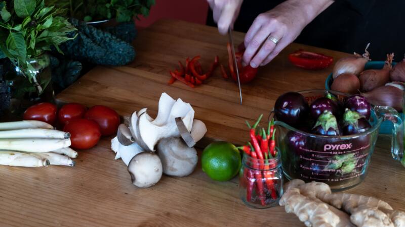 Chef Heidi Fink chopping vegetables