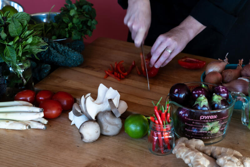 Chef Heidi Fink cutting vegetables